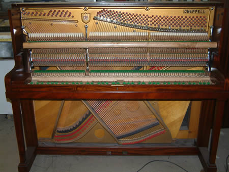 Chappell reconditioned upright piano.